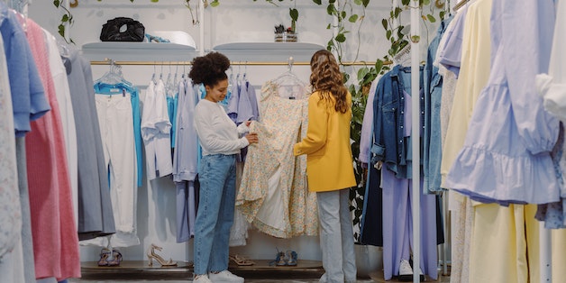 women-looking-at-clothes-in-store