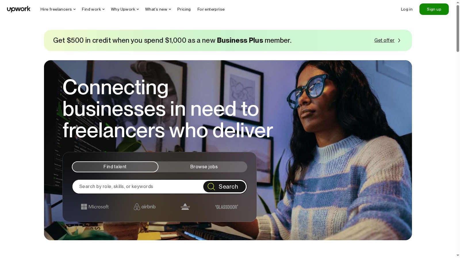 A screenshot of the Upwork homepage, highlighting the search bar for finding freelance talent.